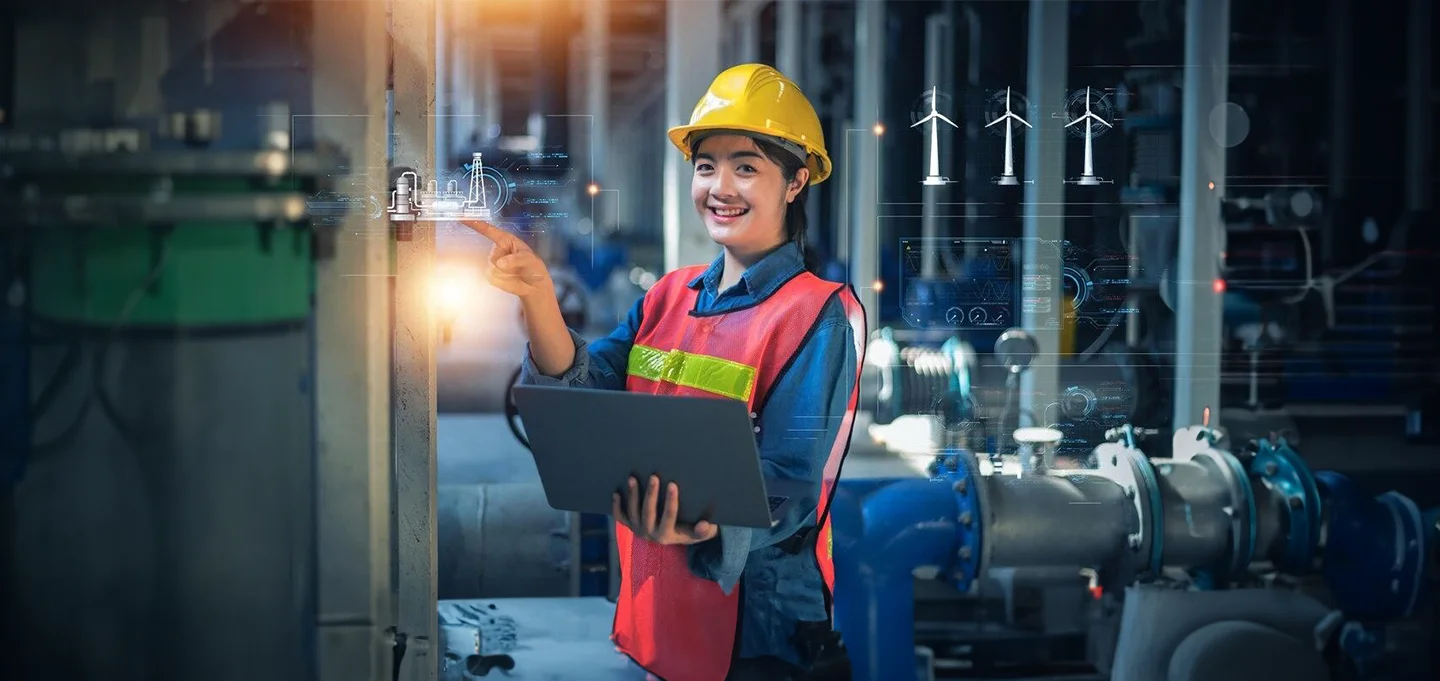 Engineer monitoring smart facility data on a tablet
