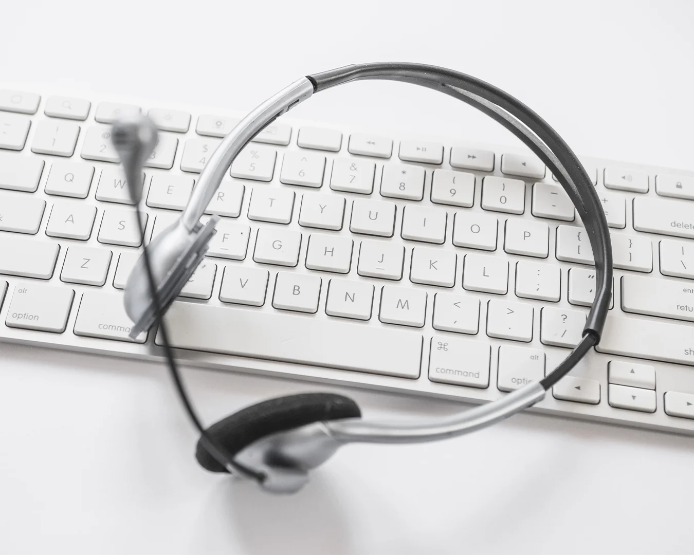 Customer support headset on a keyboard